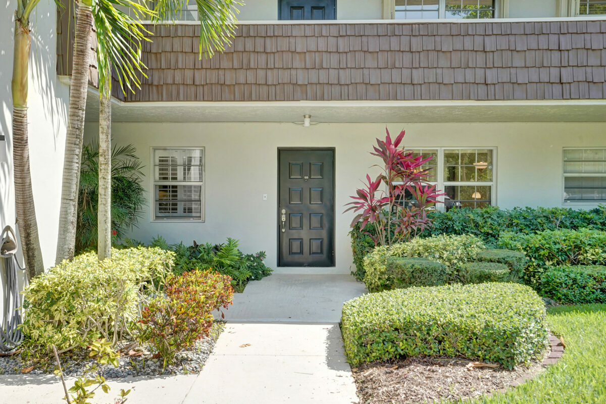 Front door of condo in Palm Aire